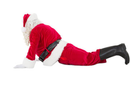 Kerstman in yogapose